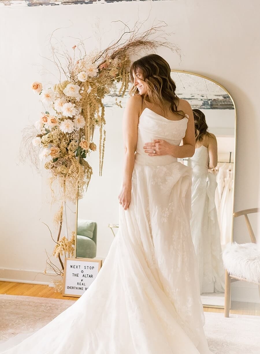 Model wearing a white gown