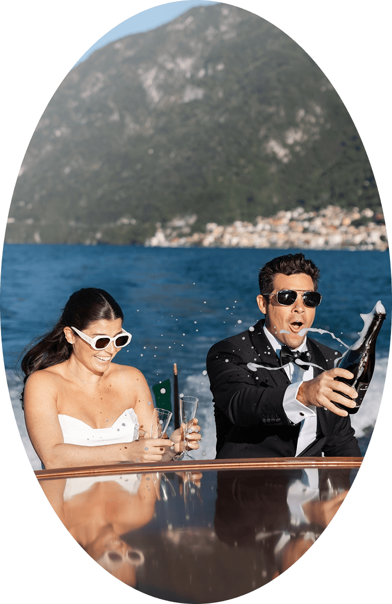 Сouple wearing a white gown and a black suit
